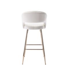 an upholstered white bar stool with gold legs and a padded seat, viewed from the front