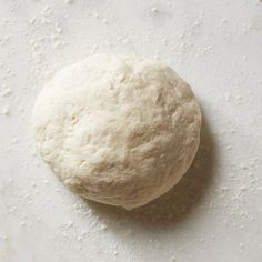 a ball of dough sitting on top of a table