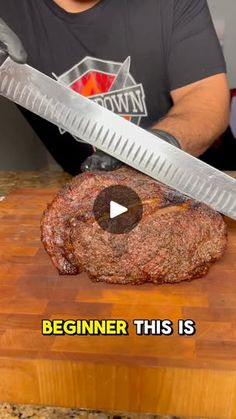 a man holding a knife over a steak on top of a wooden cutting board with the words, beginner this is