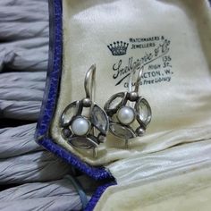 Stunning pair of sterling silver vintage earrings, they measure 2cm x 1.3cm, closed hooks, a fabulous Victorian inspired design with 3 marquise cut white topaz surrounding a delicate Mabe pearl Extremely elegant and feminine Hallmarked 925, in very good vintage  condition Weight 3.5gr All gemstones have been fully tested All silver has been fully verified Jewellery box is for presentation purposes only Victorian Hallmarked Pearl Earrings As Gift, Antique Silver Pearl Earrings For Anniversary, Vintage Silver Pearl Earrings For Formal Occasions, Silver Round Pearl Earrings With Lever Back, Silver Pearl Earrings With Lever Back, Vintage Sterling Silver Marquise Jewelry, Vintage Sterling Silver Round Earrings, Victorian Silver Pearl Earrings For Anniversary, Silver Victorian Pearl Earrings For Anniversary