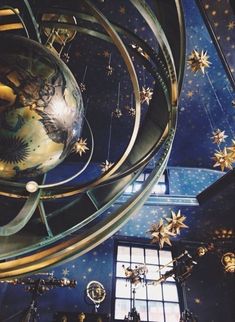 the ceiling is decorated with gold and silver stars