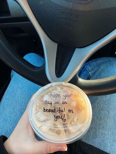 someone is holding up a plastic cup with the words hope you may be as beautiful as you are