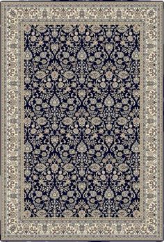 a blue and white rug with an ornate design on the bottom, in front of a black background