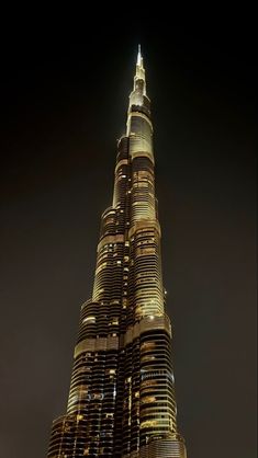 the tallest building in the world is lit up at night