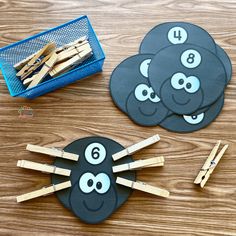 three black and white pictures with wooden sticks in the shape of animals on top of them