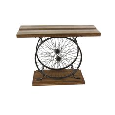 a wooden table with a bicycle wheel on it's base, against a white background