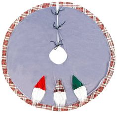 a round table with three gnomes on it's side and two red, white and green flags hanging from the top