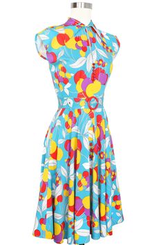 "A whop bop-a-lu a whop bam boo!" -Little Richard This 60's original bright and bold cherries print is recreated of stretch rayon in styles made for summer. Cutouts, halters, minis, and a brand new jumpsuit make this mod print feel modern! Classic Cap Sleeve with Bodice Dart Cute Oversized Collar  4 Piece Skirt with Ga Retro Sleeveless Cherry Print Dresses, Retro Fitted Cherry Print Dresses, Retro Spring Dresses With Bold Print, Retro Dresses With Bold Print For Spring, Retro Fruit Print Dresses For Spring, Retro Fitted Multicolor Print Dress, Retro Multicolor Print Fitted Dress, Fitted Multicolor Retro Print Dress, Retro Summer Dresses With Bold Print