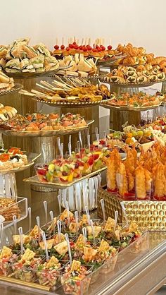 an assortment of desserts and pastries on display