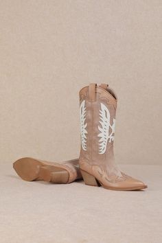 Embrace a feminine and flirty style at your next rodeo with the IDALY - Pastel Western Mid Boots. Crafted from smooth faux leather, these mid-calf boots are perfect for any festival scene, featuring a classic pointed-toe and intricate Western-inspired detailing in soft pink and beige hues. The curved topline with side pull tabs ensures easy on-and-off, while the wood-look stacked heel adds just the right amount of height. These boots combine charm and practicality, making them a must-have for th Trendy Leather Mid-calf Spring Boots, Western Knee-high Boots For Spring, Trendy Pointed Toe Mid-calf Boots For Spring, Spring Trendy Pointed Toe Mid-calf Boots, Trendy Summer Faux Leather Boots, Knee-high Faux Leather Boots For Spring, Trendy Faux Leather Boots, Spring Wide Calf Faux Leather Boots, Wide Calf Faux Leather Boots For Spring