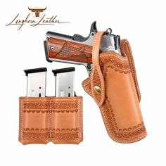 a leather holster with two knives in it and an engraving pattern on the inside side