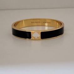 Gold Tone Kate Spade Hole Punch Bracelet. Brand New With Tags Price Crossed Out Idkw Removed Tag Only For Photos. Bag Included. Measurements In Photos. Smoke & Pet Free Home. Any Questions Feel Free To Message Me. I Do Accept Reasonable Offers! Bundle & Save! Kate Spade Elegant Black Jewelry, Elegant Black Kate Spade Jewelry, Elegant Bracelets With Black Band, Spade Jewelry, Kate Spade Jewelry, Hole Punch, Gold Black, Womens Jewelry Bracelets, Kate Spade