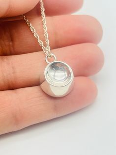 This is the perfect gift and a unique way to carry your loved ones close to your heart. ❤️FREE Personalization: message can be engraved on the back of the pendant; 18 characters maximum. ❤️Size: 1/2" diameter.  ❤️Material:  genuine 925 sterling silver ❤️Included in the package:18" matching silver chain,gift box, filling funnel kit; ❤️ Care Instructions: Though the materials used is made of sterling silver, I recommend you to not sleep, swim, or spray chemicals (i.e. perfumes, lotions, or body spray) on to the necklace to preserve its longevity. Please follow these tips to preserve the longevity of the necklace. To clean, it is best to use a soft microfiber cloth to clean the jewelry from smudges. Pet Dish, Ashes Necklace, Urn Jewelry, Memorial Jewelry, Body Spray, Silver Chain, Necklace Etsy, Lotion, 925 Silver