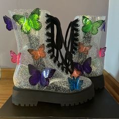 Club Exx Terrarium Butterfly Boots Size: 8 Materials: Synthetic Upper Rubber Sole Heel Height: 1.5” Platform Height: 1.25” Multicolor High-top Party Boots, Purple Round Toe Boots For Spring, Purple High-top Platform Boots, Purple Lace-up Boots For Spring, Multicolor Platform Boots With Round Toe, Purple Lace-up Party Boots, Multicolor Synthetic Boots For Party, Party Boots With Platform And Flat Heel, Multicolor Synthetic Party Boots