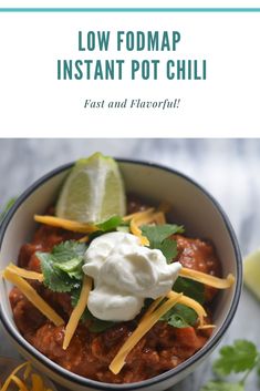 low fodmap instant pot chili in a bowl with sour cream and cilantro