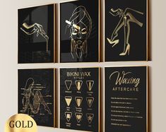 four black and gold posters on the wall