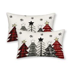 two pillows with christmas trees on them