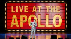 a man standing on top of a stage in front of a large sign that says live at the apollo