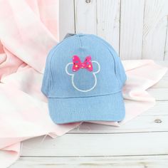 This Is A Brand New With Tags Disney Embroidered Pastel Blue Minnie Mouse Girl's Baseball Cap. Made With A Denim Like Light-Blue Fabric Detailed In Silver Embroidery, And A Confetti Decorated Embroidered Bow. Under The Bill Is A Vibrant Fun Pink Color. Back Is Adjustable. Disney X Primark Exclusive. All Orders Are Packaged With And Are Shipped Out Asap! Questions? Leave Us A Comment! We Are More Than Happy To Help! New To Poshmark? Use The Invite Code Dailyshopper73 When You Create Your Account Adjustable Cotton Mickey Mouse Hat, Cute Blue Adjustable Baseball Cap, Cute Adjustable Blue Baseball Cap, Cute Blue Baseball Cap, Blue Minnie Mouse, Hat With Braids, Girl Baseball Cap, Mickey Mouse Hat, Boys Beanie