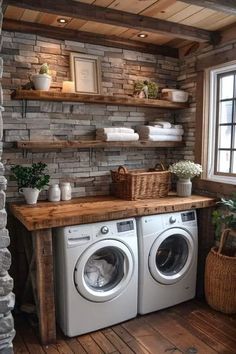 a washer and dryer in a small room with shelves above the washer