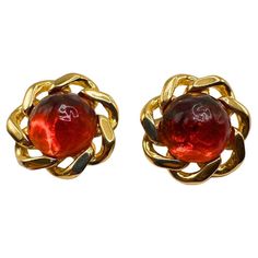 Earring Diameter: 1.32″ Bin Code: E19 / P2 Step into the past with these Antique Vintage Ciner Clip-On Orange Glass Earrings. Crafted with intricate detailing, these earrings exude timeless elegance and capture the essence of vintage charm. The earrings showcase vibrant orange glass that adds a pop of color and radiance to your ensemble. The antique finish adds to their allure, giving them a sense of history and character. With a diameter of 1.32 inches, these earrings make a statement while mai Antique Clip-on Earrings For Vintage Events, Vintage Gold Clip-on Earrings, Vintage Gold Plated Clip-on Earrings, Red Vintage Clip-on Earrings, Glass Art Deco, Vintage Orange Clip-on Earrings, Vintage Clip, Antique Finish, Timeless Treasures