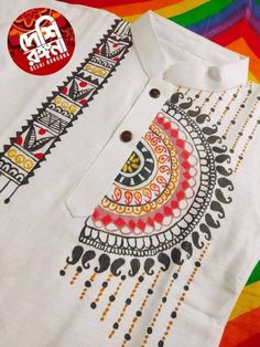 a white shirt with colorful designs on it