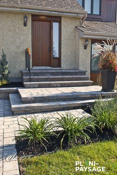 a house with steps leading to the front door