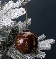 an ornament hanging from a christmas tree