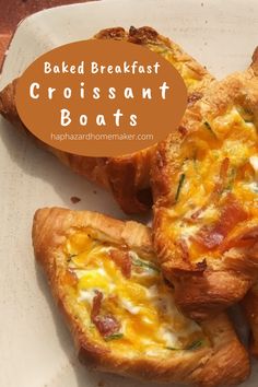 baked breakfast croissant boats on a white plate