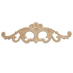 an ornate wooden frame with flowers and scrolls on the edge, in beige wood finish