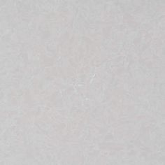 a white marble tile with a square border