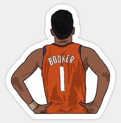 the back of a basketball player with his hands on his hips wearing an orange jersey