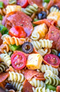 pasta salad with tomatoes, olives, and peppers