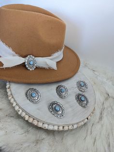 Concho Hat Pins!  These pins have a brooch pin back.  Update your favorite western hat. Pin to shirt, jacket, purse, scarf, beanie, fedora or Bandana! Use as a lapel pin. looking for a unique Boutonniere? Or Lapel Pin. Add a pin almost anywhere!   All pins have a brooch back  Hat Not included Please note: Due to the handmade nature of these size and color may slightly vary. Handmade by @TeresaLovesCrafts in Torrance, CA If you have any questions or special requests in regard to your order, pleas Unique Boutonniere, Custom Cowboy Hats, Boutonniere Pins, Hat Jewelry, Bar Shirt, Custom Trucker Hats, Western Hat, Purse Scarf, Hat Clips