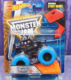 the monster truck has blue wheels on it