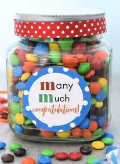 a jar filled with lots of colorful candy