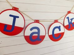 three red, white and blue letters are hanging from a string on the wall that says jalapeno