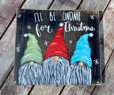 three gnomes painted on a wooden sign that says, i'll be gnomeme for christmas