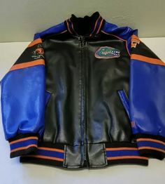 Urban Leather Outerwear For College, Blue Leather Streetwear Outerwear, Blue Leather Outerwear For Streetwear, Sporty Leather Jacket For College, Sporty Leather Jacket With Long Sleeves, Sporty Leather Biker Jacket, Men Winter Jacket, University Of Florida, Florida Gators