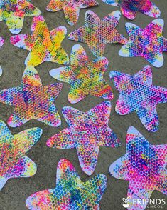 colorful stars are arranged on the ground for arts and crafts to do with their own hands