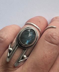 This Labradorite Queen is for the queen!! I adore this ring... finally time to let it go! A stunning rose cut super Blu flash Labradorite stone is held within a simple bezel with rope border. This setting sits atop a chunky band with angular details. Ring band has rope border as well as fine silver ball details at the top.  I have oxidized and polished this beauty up to showcase the gorgeous Labradorite. Handmade from scratch & ready to ship! Xo  *Size 6* *Please feel free to ask me additional q Silver Ring Chunky, Silver Smithing Jewelry, Simple Ring Design, Silversmith Rings, Jewelry Closet, Rope Border, Armor Ring, Ancient Jewelry, Funky Jewelry