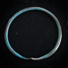 "I hand forge each of these unique, rustic bangles from pure, organic copper. They are attractive and comfortable to wear alone or mixed and layered with other bracelets or cuffs for a true BOHO vibe. Bangle is approximately 4.5mm thick x 2.5\" inside diameter as shown. They are adjustable to fit most sizes. If you need a specific size (inner diameter), please convo me or leave a note in the comments at checkout. You may order this bangle with or without the patina. Choose from the drop down men Artisan Bangle Bracelet With Patina, Bohemian Copper Bangle Jewelry, Artisan Bronze Bracelets With Patina, Bronze Bangle Bracelet With Patina, Hand Forged Copper Bangle Bracelet, Artisan Bronze Patina Bracelets, Bohemian Copper Bangle, Blue Bohemian Copper Bracelet, Artisan Electroformed Bangle Bracelets