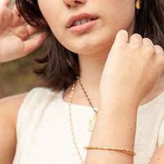 A brilliantly-crafted dot cuff, cast in solid brass - a slim, sleek adornment with all the sculpted finesse. Tough enough to go solo, yet swanky enough for stacking with other LGJ cuffs! One size - make it fit your own shape. Classic Hammered Cuff Bracelet, Elegant Hand Forged Adjustable Bangle, Classic Hammered Bracelet Jewelry, Classic Brass Bangle Bracelets, Elegant Everyday Cuff Bracelet With Oyster Design, Timeless Gold Cuff Bracelet For Everyday Wear, Everyday Gold Timeless Cuff Bracelet, Minimalist Yellow Gold Brass Cuff Bracelet, Minimalist Brass Bracelets Tarnish Resistant