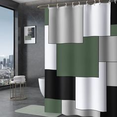 a bathroom with a green and white shower curtain