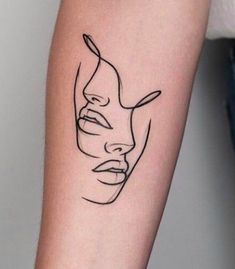 a woman's face is shown on the right side of her arm, with black lines