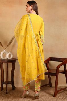 Grab this beautiful 3-piece set. The set comes with embroidered anarkali kurta has v neck, 3/4th sleeves & calf length teamed with matching trouser pant with side pocket and an embroidered organza dupatta. Color - Yellow Kurta Fabric-Silk Blend Pant Fabric-Silk Blend Dupatta Fabric - Organza Neck-V Neck Sleeves-3/4th Sleeves Work -Embroidery Detailing Washing Instructions-Dry Clean DISCLAIMER - The color of the product may be differ due to screen settings of device. A misprint here and a color d Yellow Kurta, Embroidered Anarkali, Formal Jewelry, Embroidery Detailing, Anarkali Kurta, Embroidered Organza, Yellow Silk, Organza Dupatta, Anarkali Suit