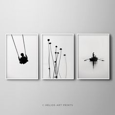 three black and white pictures hanging on the wall next to each other, one with a person in a boat