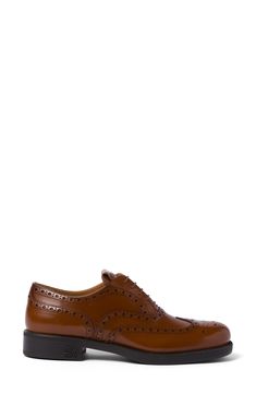 Featured in Miu Miu's fall '23 runway show, this wingtip oxford with classic broguing was created in collaboration with the storied British footwear maker. 1 3/4" (44mm) heel; 1" platform (size 38.5) Lace-up style Leather upper and lining/rubber sole Made in Italy Designer Shoes Luxury Brown Wingtip Oxfords, Luxury Cognac Oxfords With Brogue Detailing, Luxury Brown Derby Shoes With Brogue Detailing, Luxury Brown Derby With Brogue Detailing, Luxury Cognac Dress Shoes With Brogue Detailing, Luxury Brown Oxfords With Goodyear Welt, Luxury Wingtip Oxfords With Leather Lining, Luxury Brown Goodyear Welted Oxfords, Elegant Cognac Oxfords With Goodyear Welt Construction