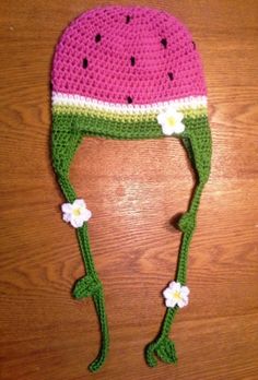 a crocheted hat with watermelon on it