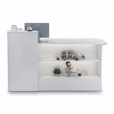 a white display case with shelves on both sides